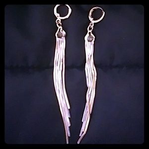 Long silver and golden earrings